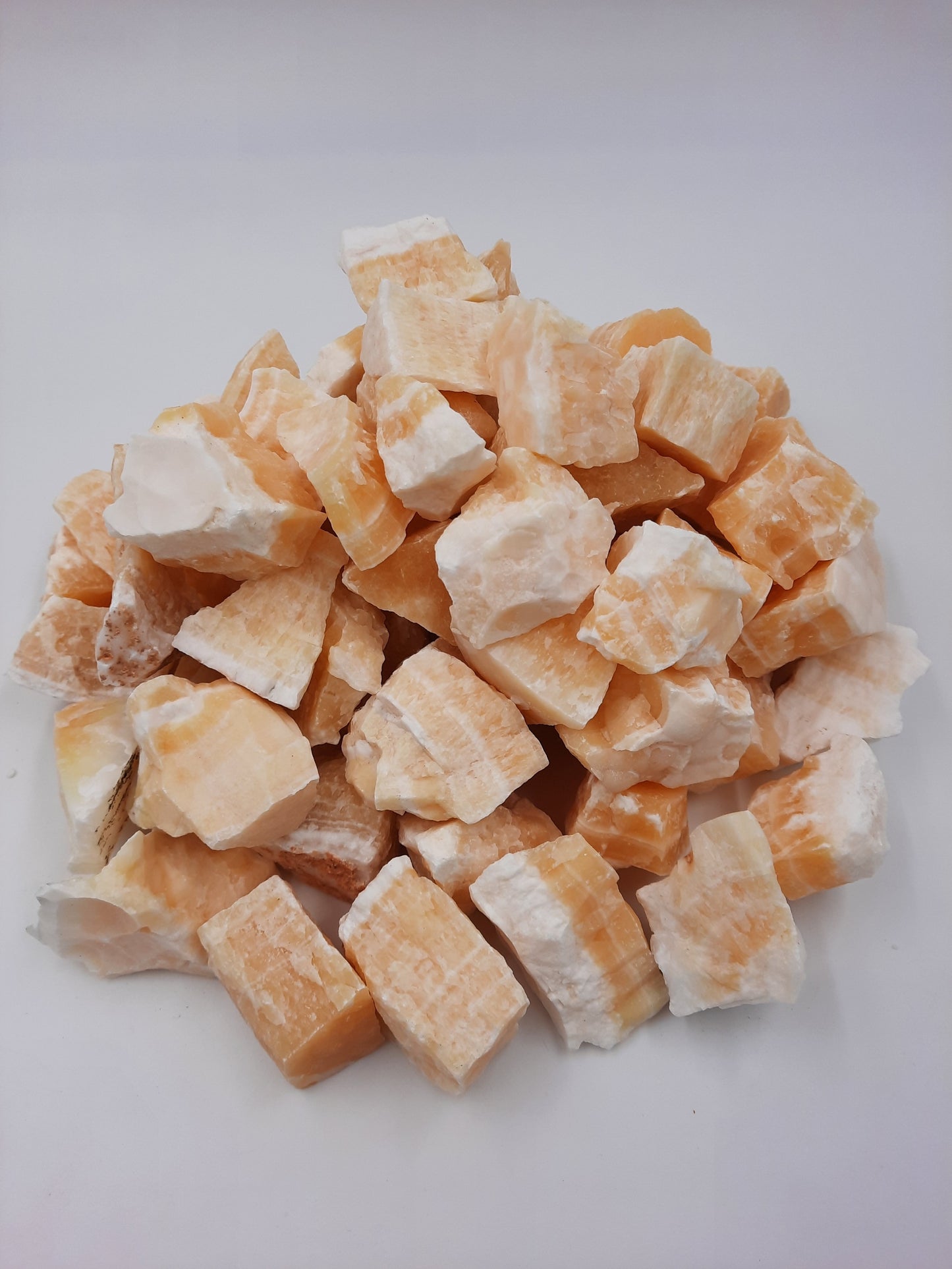 Pina-Colada Calcite lot. Pretty stone with yellow and white layers.